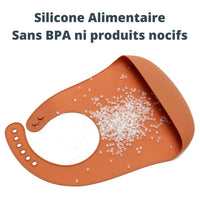 Bavoir silicone avec poche récupératrice
